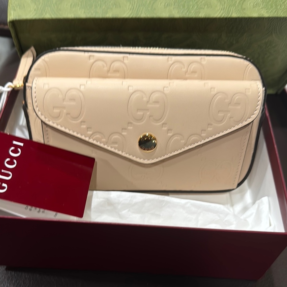 Gucci super mini gg Crossbody/shoulder Bag with Embossed Leather and chain strap